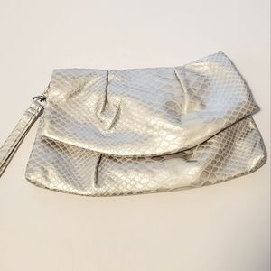 Mirror Mirror Silver animal print Clutch or Wristlet. Like New Condition